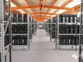 Large-scale mining farm implementing firmware upgrades for energy efficiency